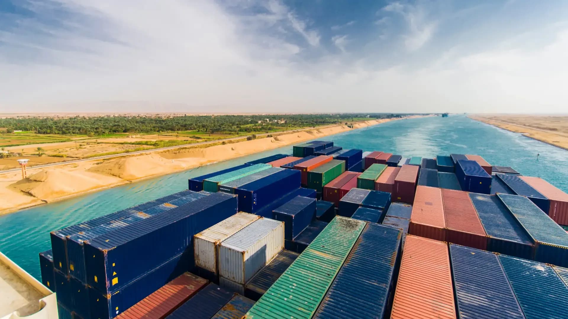 A container ship loaded with cargo transiting the Suez Canal
