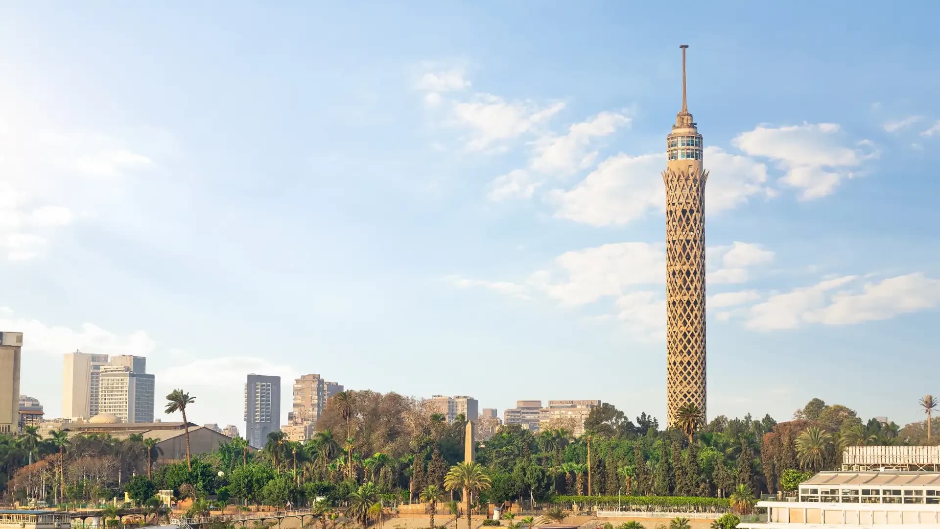 Cairo Tower rising above the Nile and Gezira's gardens
