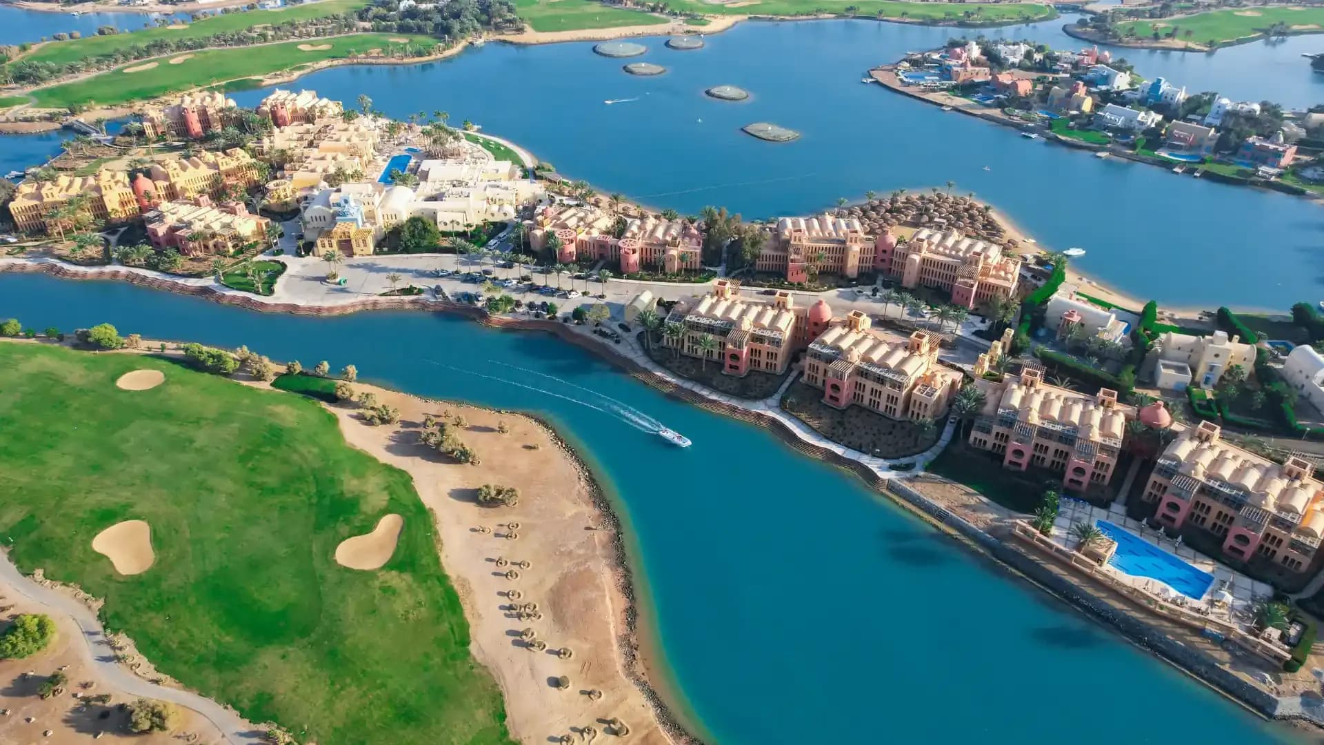 Aerial view of El Gouna lagoons, completed buildings and the golf course