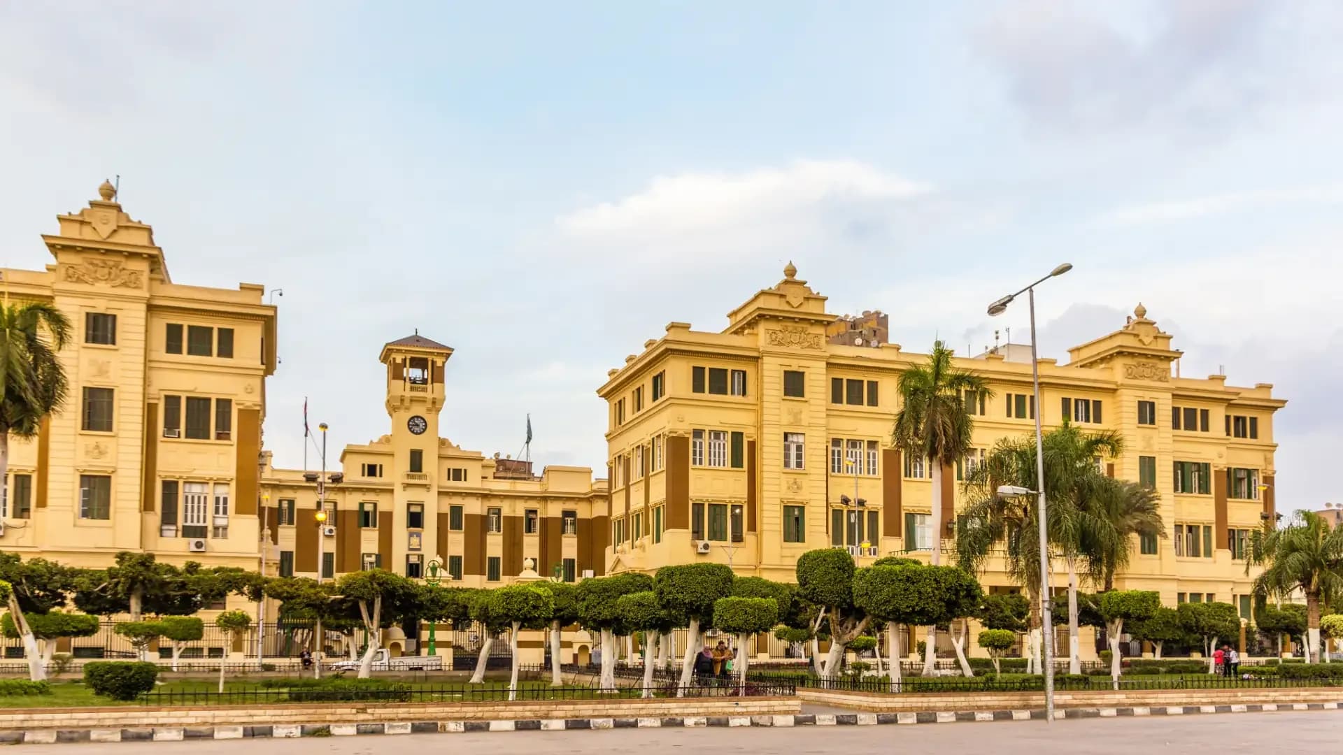 A historic government building with a clock tower in Abdeen, Cairo